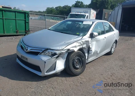 2012 Toyota Camry Le z USA, uszkodzony, nr VIN 4T4BF1FK7CR214004